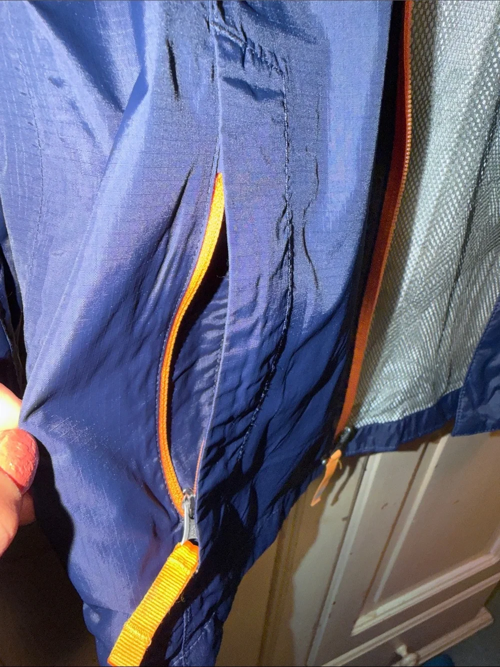 The North Face Kids Navy Blue and Orange Raincoat